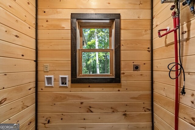 interior space featuring wood walls