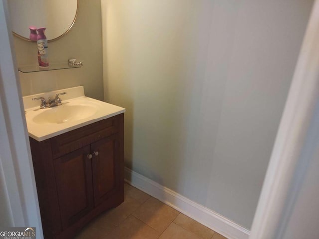 bathroom featuring tile patterned floors and vanity