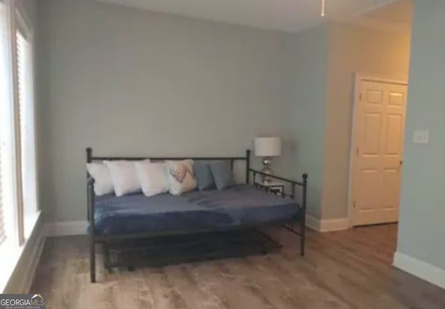 bedroom featuring hardwood / wood-style flooring