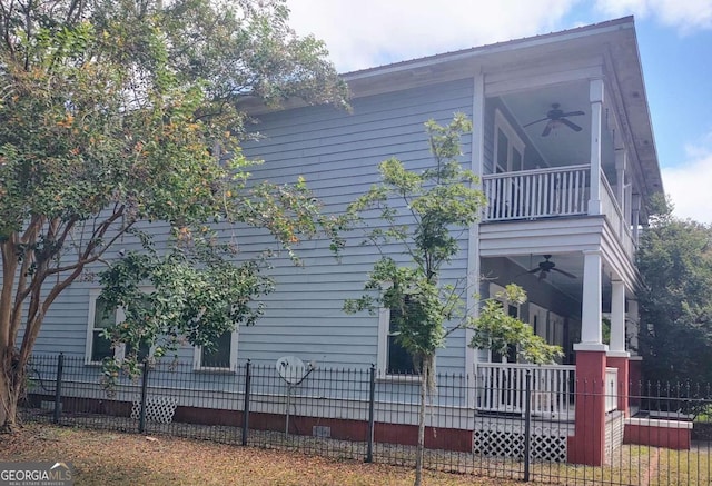 view of home's exterior with ceiling fan