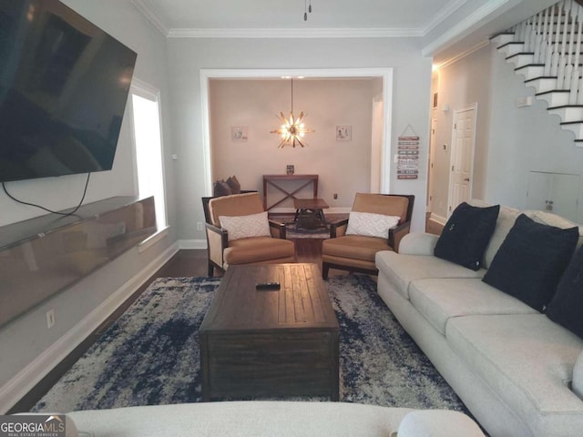 living room with a chandelier, dark hardwood / wood-style floors, and ornamental molding