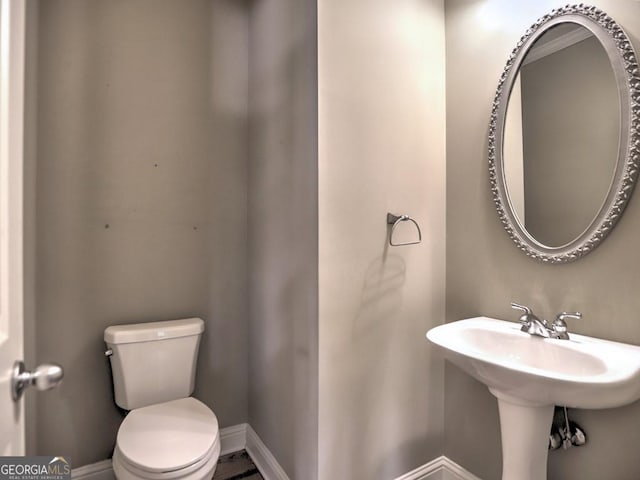 bathroom featuring toilet