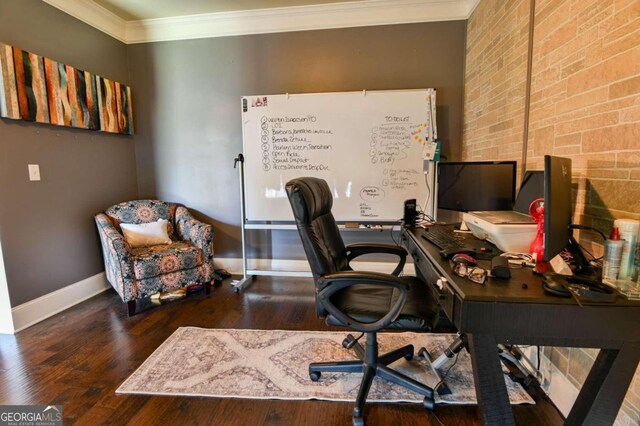 office area with crown molding, dark hardwood / wood-style flooring, and brick wall