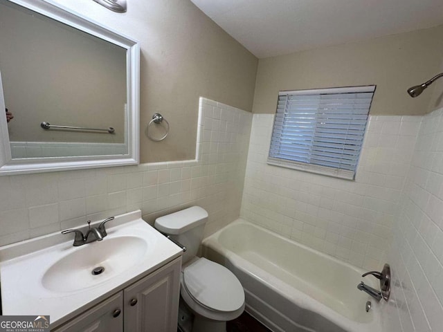 full bathroom with toilet, vanity, decorative backsplash, bathing tub / shower combination, and tile walls