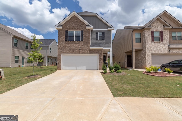craftsman inspired home featuring board and batten siding, an attached garage, brick siding, and a front yard