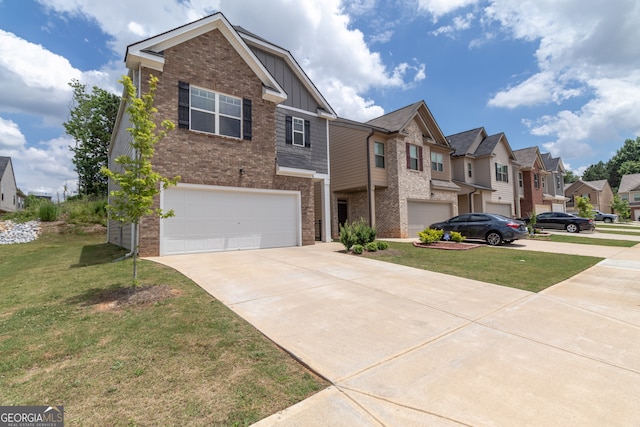 view of front of house featuring a garage and a front lawn