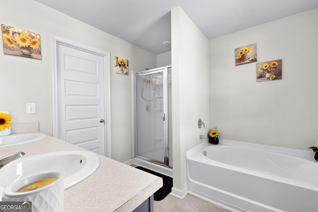 full bathroom with a garden tub, a sink, a shower stall, and double vanity