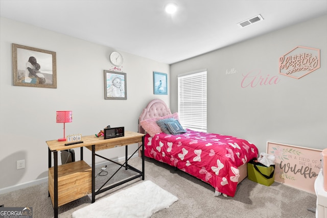 carpeted bedroom with visible vents