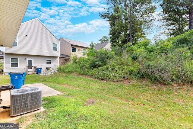 view of yard featuring central AC unit