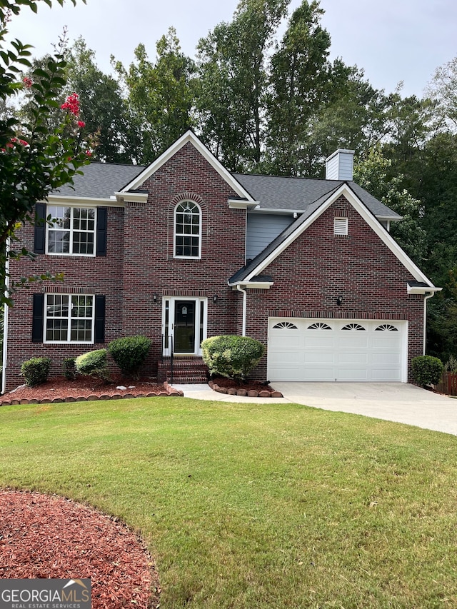 view of front of home with a front lawn