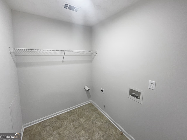 clothes washing area featuring hookup for a washing machine, hookup for a gas dryer, and hookup for an electric dryer