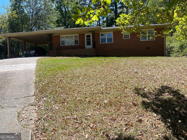 ranch-style home with a carport