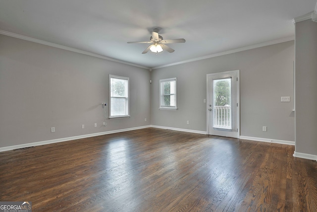 spare room featuring ornamental molding, ceiling fan, and dark hardwood / wood-style floors