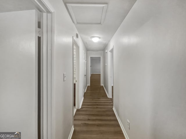 720 Smithstone Rd SE, Marietta, GA 30067 - hall featuring attic access, baseboards, and dark wood-type flooring