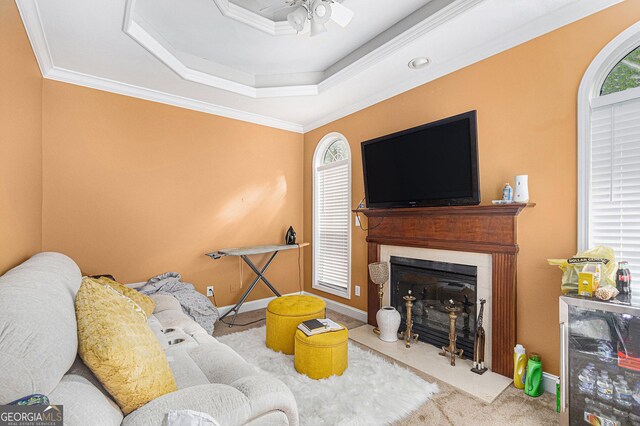 carpeted living room with ceiling fan, wine cooler, and crown molding