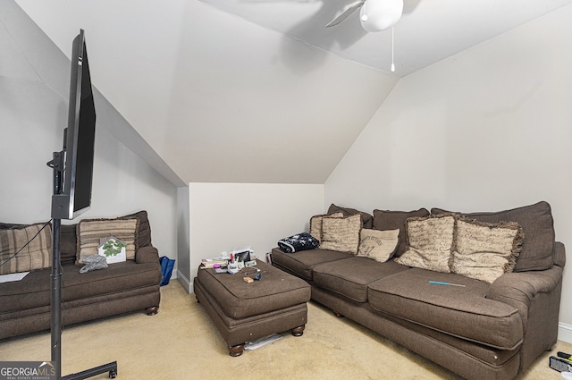 carpeted living room featuring lofted ceiling and ceiling fan