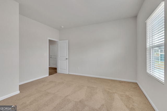 view of carpeted spare room