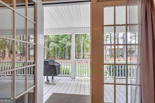 doorway to outside featuring a wealth of natural light