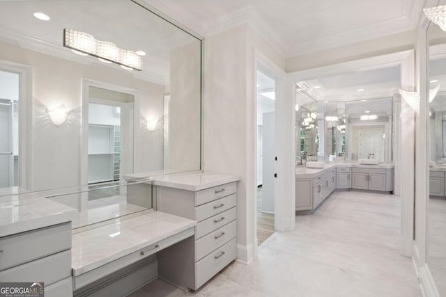 bathroom featuring vanity and ornamental molding