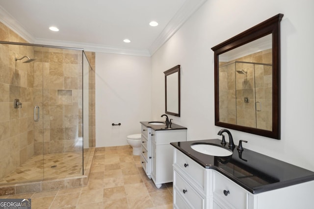 bathroom with walk in shower, toilet, vanity, and ornamental molding