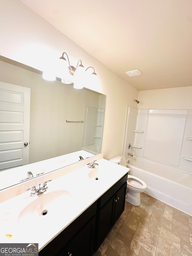 full bathroom featuring vanity, toilet, and shower / bathtub combination