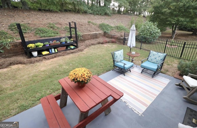 view of patio / terrace with fence