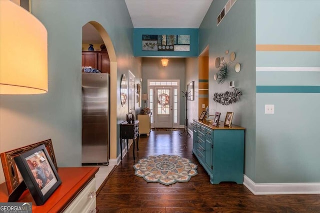 foyer with dark wood-type flooring