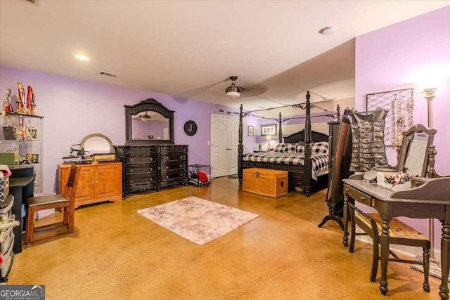 bedroom featuring concrete floors