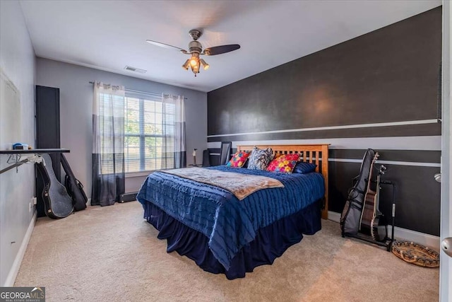 carpeted bedroom with ceiling fan