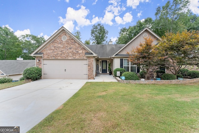 view of front of house with a garage and a front lawn