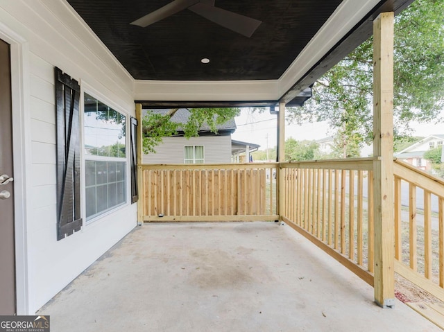 view of patio with a porch and ceiling fan