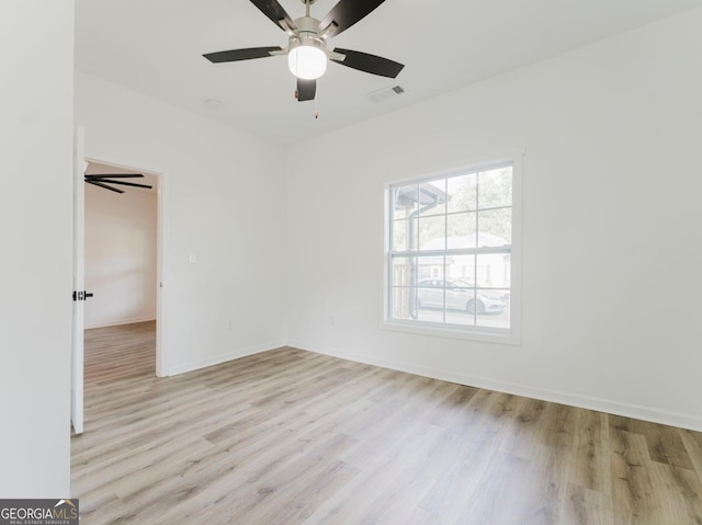 unfurnished room with ceiling fan and light hardwood / wood-style floors