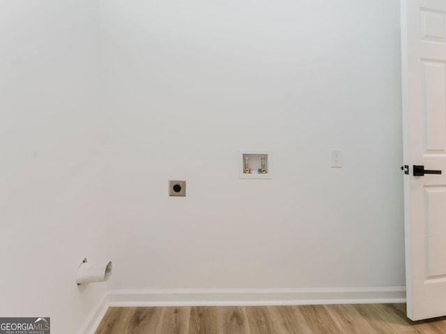 clothes washing area with hookup for an electric dryer, light wood-type flooring, and hookup for a washing machine