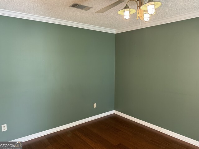 unfurnished room with a textured ceiling, crown molding, ceiling fan, and hardwood / wood-style floors