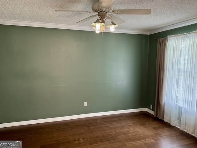 spare room featuring ceiling fan, hardwood / wood-style flooring, ornamental molding, and a textured ceiling