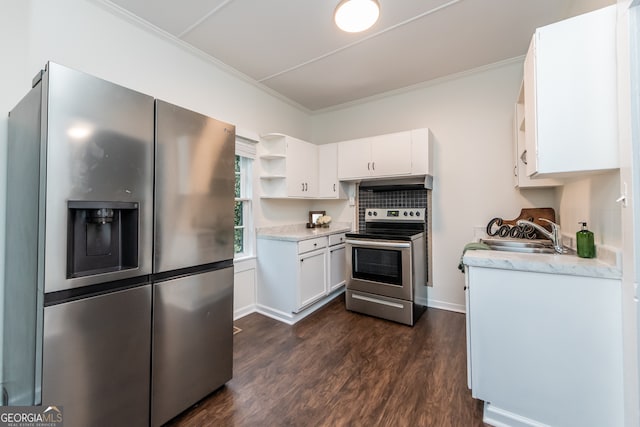 kitchen with white cabinetry, dark hardwood / wood-style flooring, sink, decorative backsplash, and appliances with stainless steel finishes