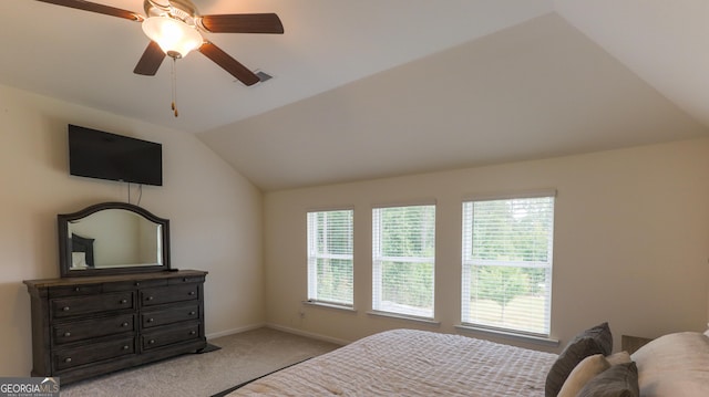 carpeted bedroom with lofted ceiling and ceiling fan