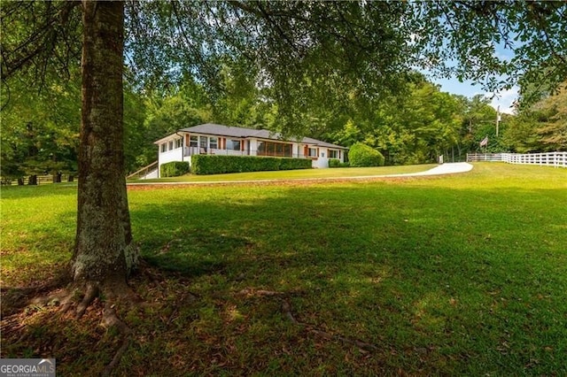 view of yard with fence