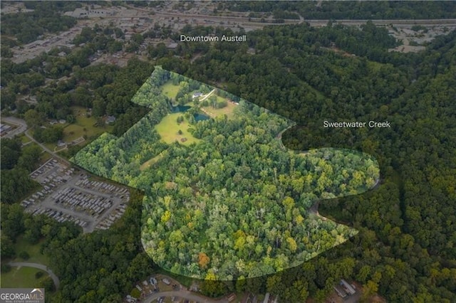 bird's eye view featuring a view of trees