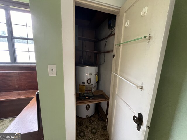 bathroom featuring gas water heater