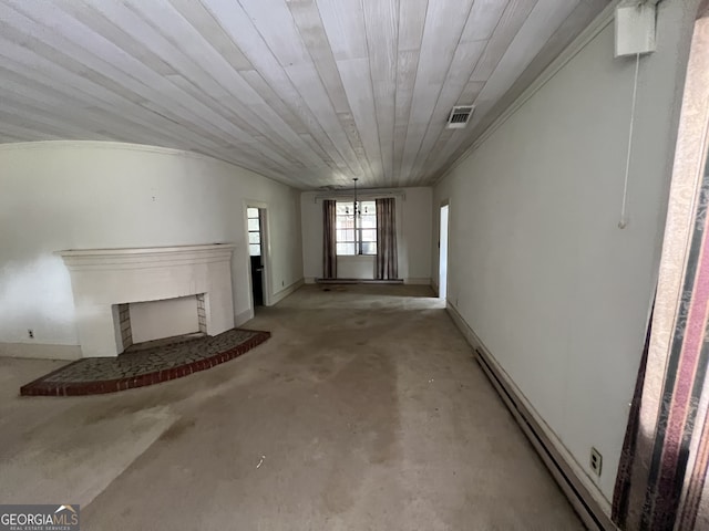 interior space with concrete flooring, wood ceiling, and a baseboard heating unit