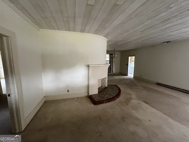 interior space with a fireplace, wood ceiling, and ornamental molding