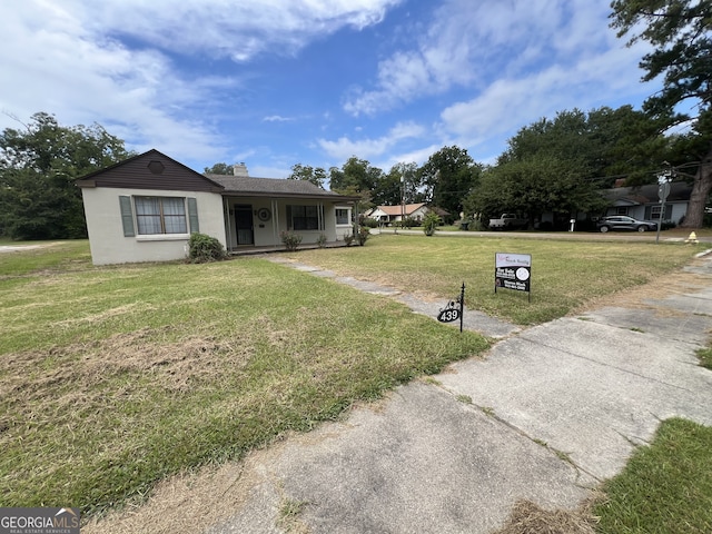 view of front of house with a front yard