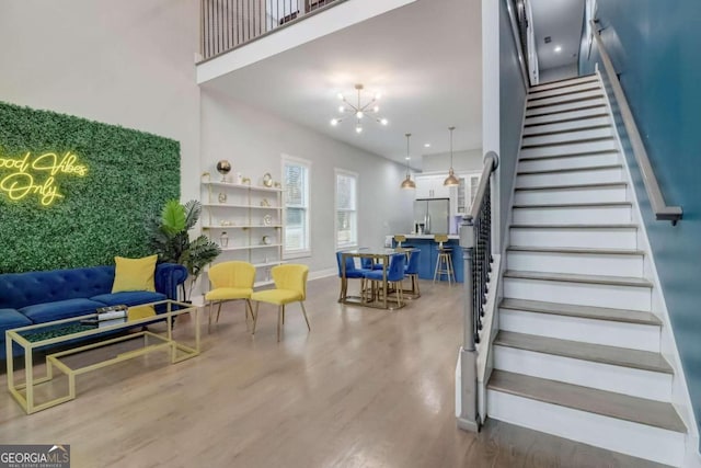 interior space featuring hardwood / wood-style floors and a chandelier