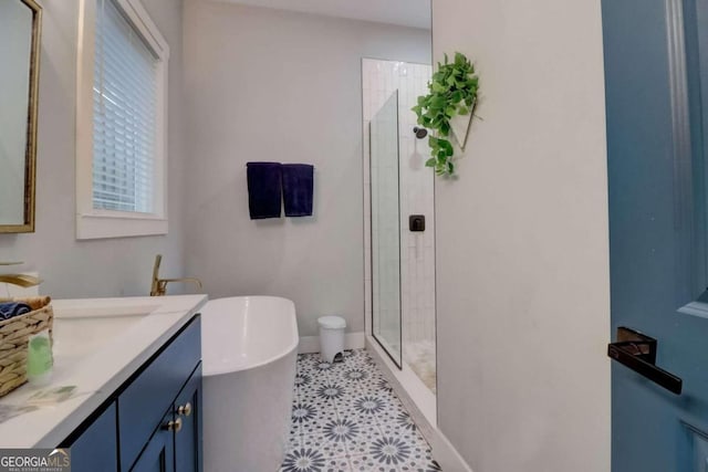 bathroom featuring independent shower and bath and vanity