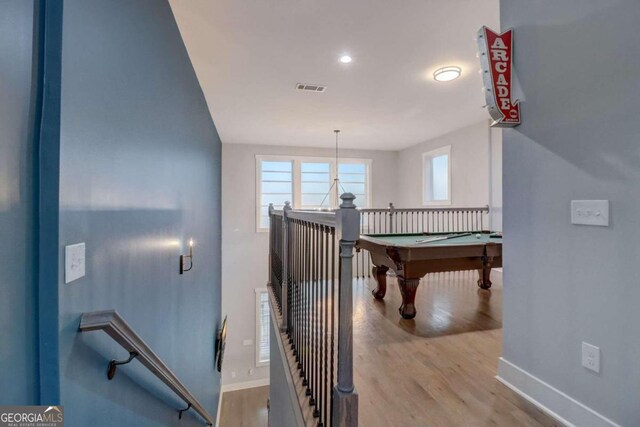 rec room featuring hardwood / wood-style floors and billiards