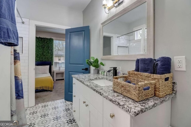 bathroom with vanity and walk in shower