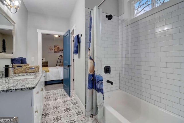 bathroom featuring shower / bath combination with curtain and vanity