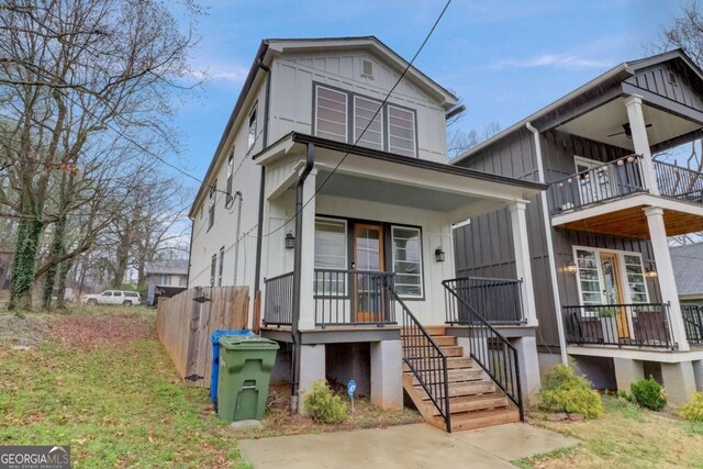 view of front of home with a balcony and covered porch