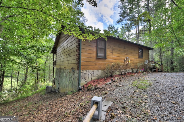 view of home's exterior featuring central AC unit